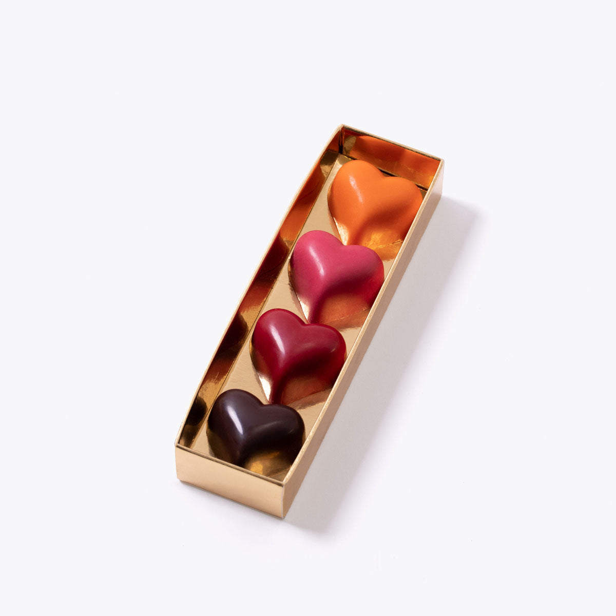 Caja con 4 bombones de diferentes colores