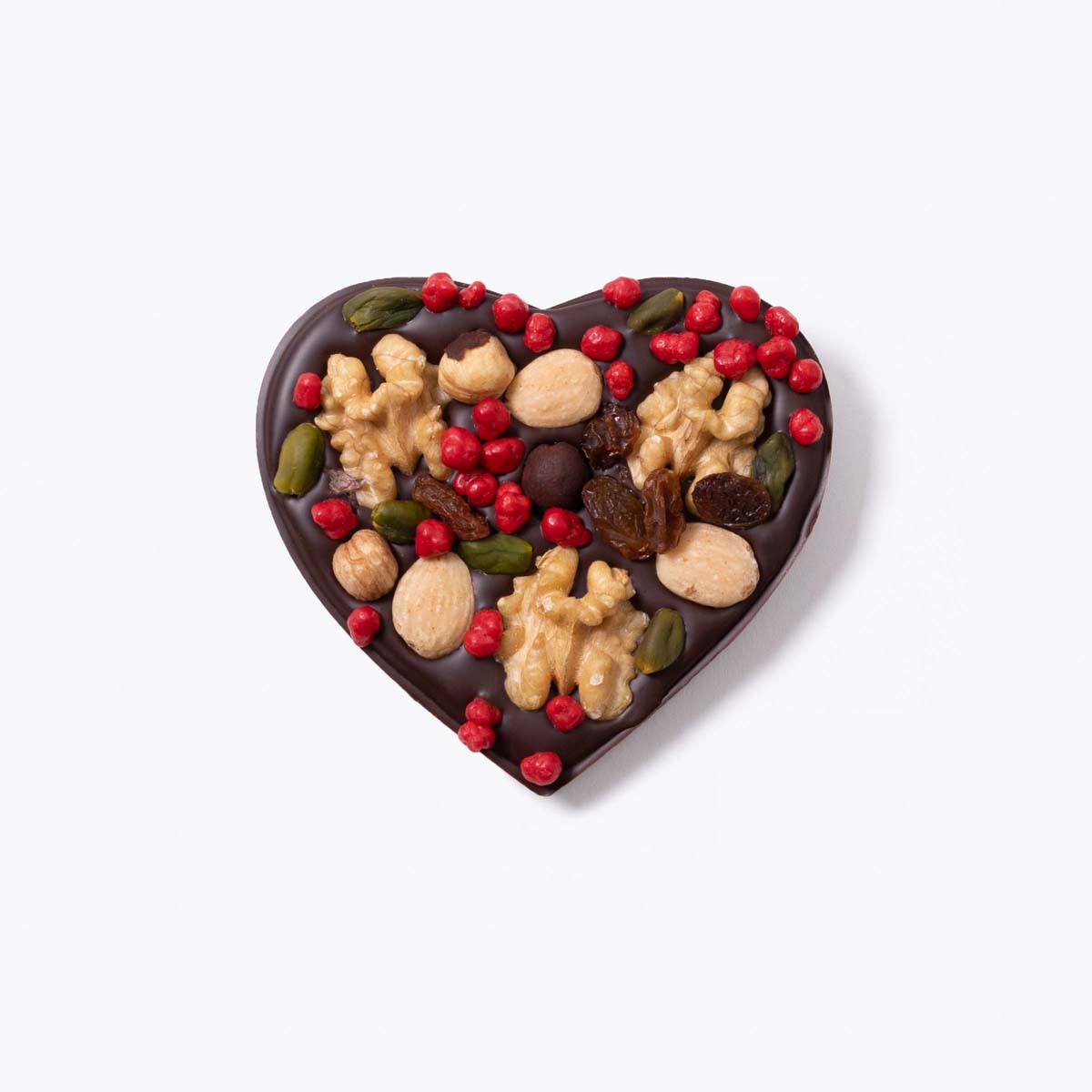 Tableta con forma de corazón con frutos secos